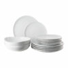 Set di piatti Rosenthal Junto Weiss: eleganza senza tempo in pregiata porcellana bianca, perfetto per ogni occasione e resistente all'uso quotidiano.